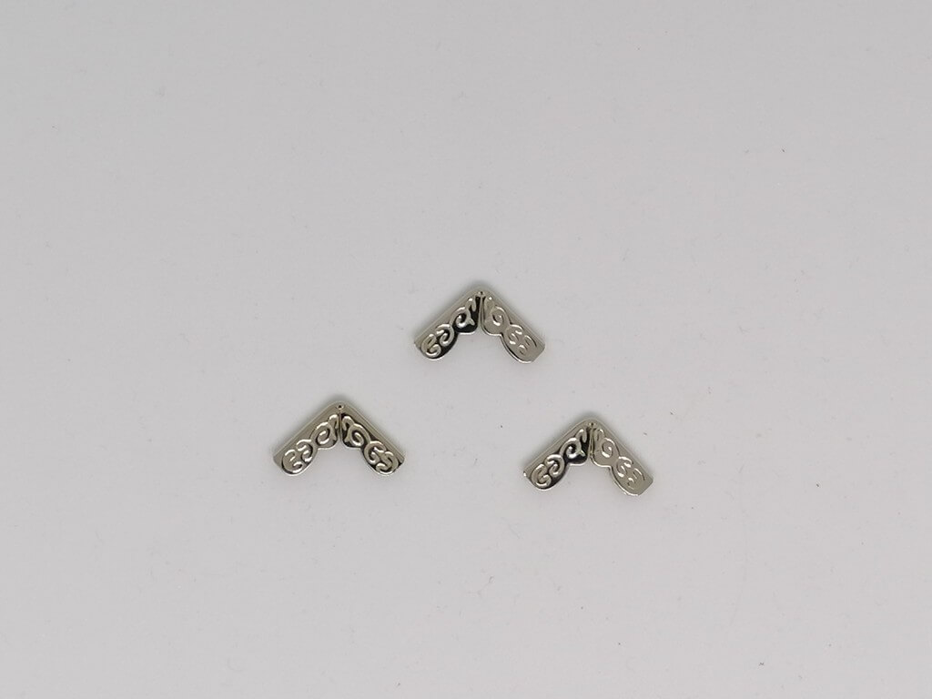 Kovový rožek 16x16 mm ornament nikl